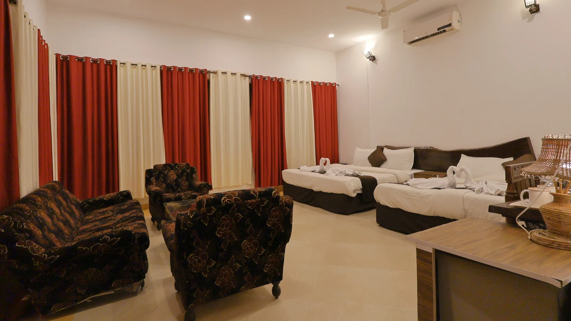 Family Room featuring a sofa bed and private washroom at Wildmark Kanha Resort