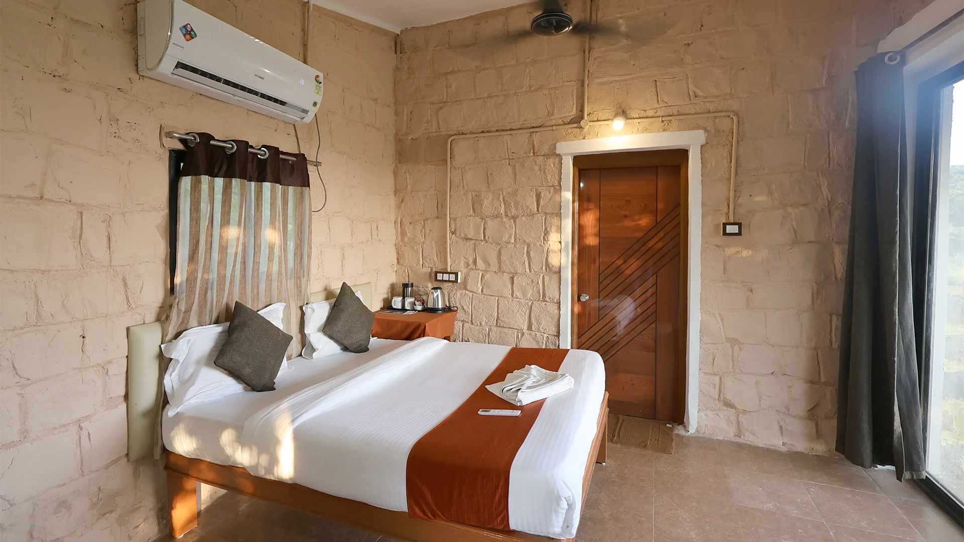 Luxury Machaan Cottage featuring a king-size bed at Tadoba