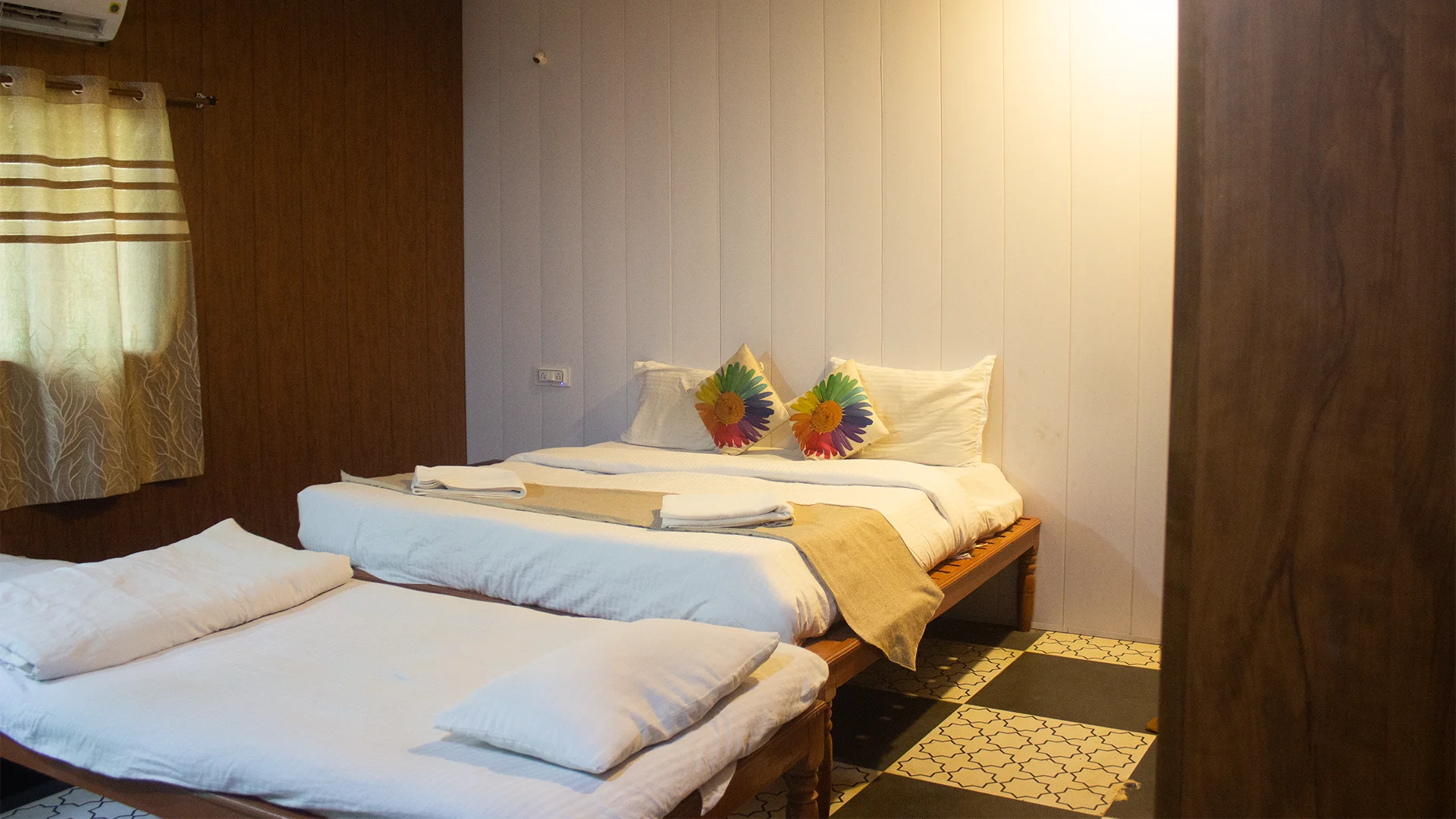 Comfortable AC Standard Room with king-size bed at Tadoba Safari Stay Resort